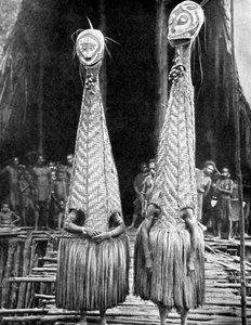 Güzellik yardımcısı olarak giyilen goblin maskeleri ve siperlikleri, Papua, Yeni Gine, 1936. by Fox Photos