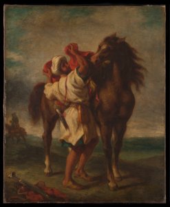 Arap atını eyerliyor by Georges Décote
