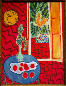 Kırmızı iç mekan, mavi masa üzerinde natürmort by Henri Matisse