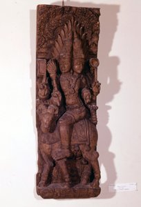 Ateş tanrısı Agni, Hindu mitolojisine göre bir koç üzerinde iki başlı (bisefali) tasvir edilmiştir. 17. yüzyılın ahşap heykeli. Paris, Guimet Müzesi. by Indian School