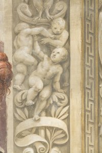 Putti, pencerelerin etrafındaki süslemeler (fresk)