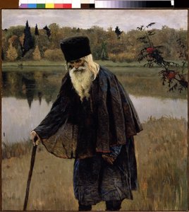 Bir Münzevi (Bir Münzevi). Sakallı ve beyaz saçlı yaşlı bir adam, bir gölün kıyısında bastonunun üzerine eğilmiş yürüyor. Mikhail Vasilyevich Nesterov'un (1862-1942) tablosu, tuval üzerine yağlı boya