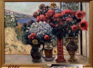 Denize karşı çiçekler Pyotr Ivanovich Petrovichev'in (Pyotr Petrovichev) (1874-1947) tablosu, tuval üzerine yağlı boya