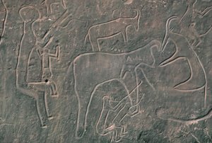 İnsan figürleri ve hayvanlar (kaya resmi) by Prehistoric