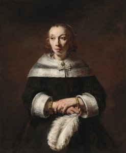 Devekuşu Tüylü Yelpazeli Bir Kadının Portresi by Rembrandt van Rijn
