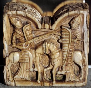 Romanesk sanat: iki şövalye arasındaki savaşı temsil eden dama piyonu. Fildişi heykel. İspanya