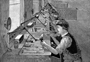 Bir Amerikan fabrikasında bisiklet parçalarının lehimlenmesi, c1900 by Unbekannt