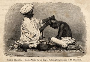 Kalküta sokaklarında çalışan bir berber. Hindistan