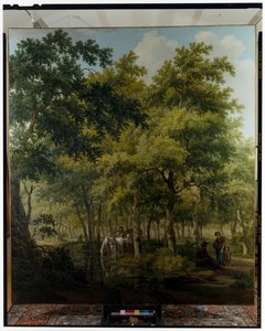 Ormanlık bir sahnede Nehrin kıyısına yakın el arabalı köylüler by Willem Uppink