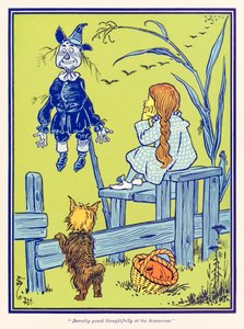 ?Dorothy Korkuluk'a düşünceli bir şekilde baktı.? ?Harika Oz Büyücüsü? tarafından L. Frank Baum