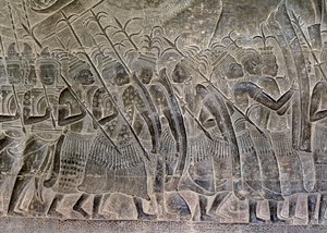 Angkor Wat, Angkor, Kamboçya 12. Yüzyılın başlarında, sonradan eklemeler. Galerideki kabartmaların bu detayı, Khmer ordusunun müttefiki olarak yürüyen THAI halkını gösteriyor.