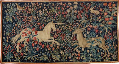 Bir tek boynuzlu at ve bir çiçek tarlasında bir geyik, c. 1500. by Anonymous master.