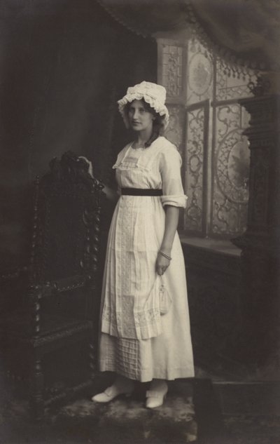 Dantel şapkalı kız by Arthur C. Burgess