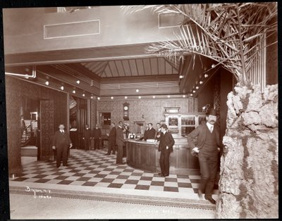 The lobby and registration desk at the Hotel Victoria, 1900 or 1901 (silver gelatin print) by Byron Company