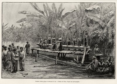 Batak kadınları, kuzey Sumatra etnik grubu, pirinç dövüyor ve temizliyor. Jules Claine (1856-1939) tarafından “Malezya