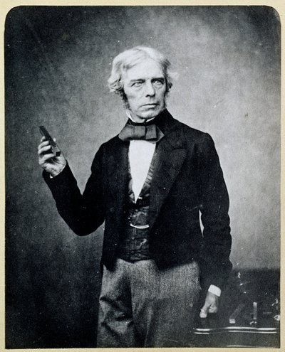 Michael Faraday (1791-1867) elinde bir Çubuk Mıknatıs tutarken, Maull ve Polyblank tarafından by English Photographer