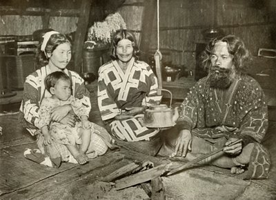 Ainu Erkek ve Kadın Evde, 1910. by Herbert Ponting