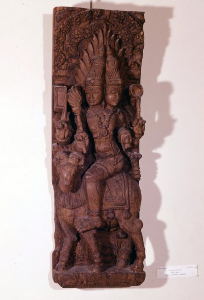 Ateş tanrısı Agni, Hindu mitolojisine göre bir koç üzerinde iki başlı (bisefali) tasvir edilmiştir. 17. yüzyılın ahşap heykeli. Paris, Guimet Müzesi. by Indian School