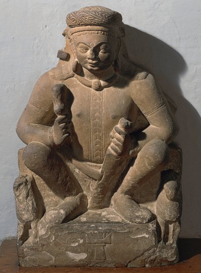 Surya, güneş tanrısı. kırmızı kumtaşı heykel by Indian School