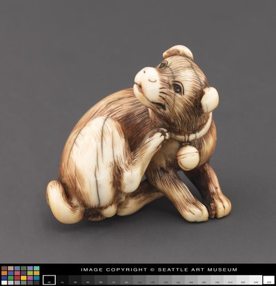 Netsuke, kendini tırmalayan bir köpek olarak modellendi. boyun by Japanese School