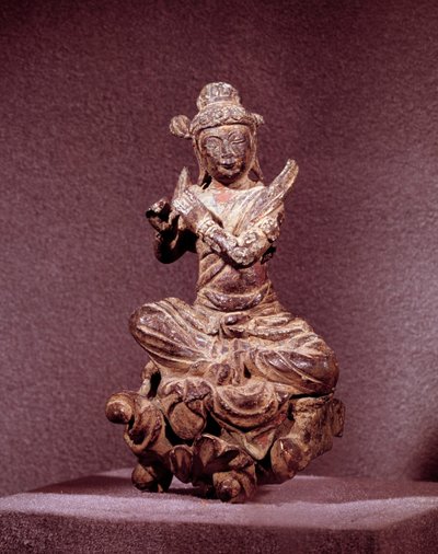 Art Coreen: Celeste olan altın bronz bir Apsara