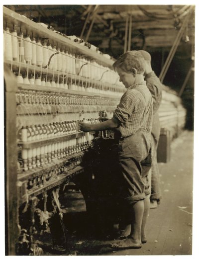 Young doffers replacing full bobbins at North Pownal, Vermont, 1910  by Lewis Wickes Hine