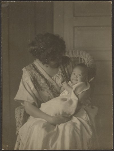 [Florence Sallanan Sandalyede Bebek Tutuyor] by Louis Fleckenstein