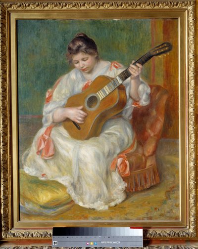 Kadın gitar çalıyor. Pierre Auguste Renoir