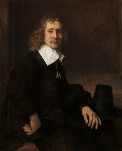 Bir Masada Oturan Genç Bir Adam muhtemelen Govaert Flinck, c. 1660. by Rembrandt van Rijn