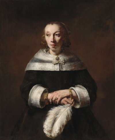 Devekuşu Tüylü Yelpazeli Bir Kadının Portresi by Rembrandt van Rijn
