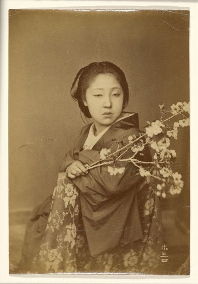 [Çiçek Açmış Prunus Dalını Tutan Japon Kadın] by Unknown artist