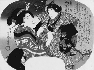 Aiban uchiwa-e: Çocuğunu giydiren bir kadın by Utagawa Kunisada
