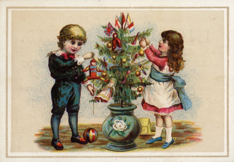 Küçük bir Noel ağacı süsleyen çocuklar by American School