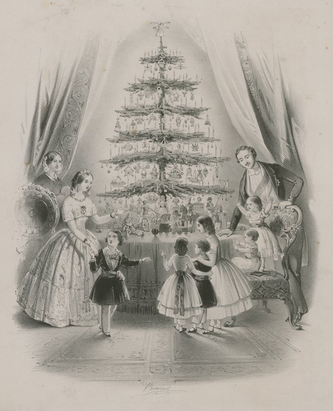 Bir Noel ağacının etrafında duran bir aile by English School